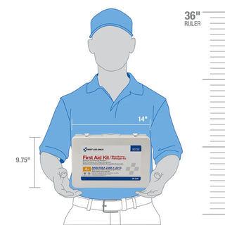 Mannequin holding a first aid kit with dimensions labeled
