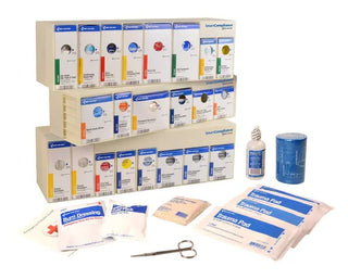 First aid kit with various supplies including bandages and a scalpel on a white background