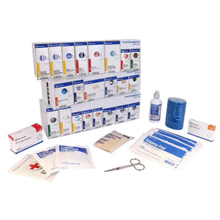 First aid kit with various supplies on a white background