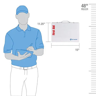 Measurement chart showing a person holding a tablet, a first aid kit, and a ruler for scale.