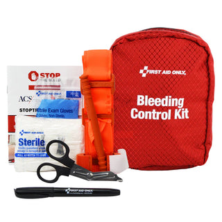 Red bleeding control kit with bandages, scissors, and other supplies on a white background