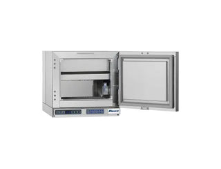 Follet FZR1 Countertop Freezers, 0.6 cu. ft. with open door on a white background