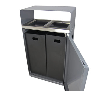 Frost 2021 indoor and outdoor dual-stream waste and recycling receptacle with brushed stainless steel waste inlets, grey powder-coated steel body, and two removable liners.