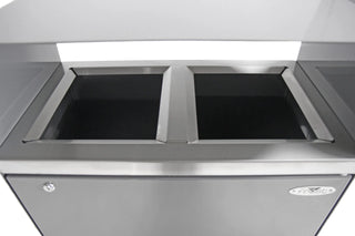 Frost 2021 indoor and outdoor dual-stream waste and recycling receptacle with brushed stainless steel waste inlets, grey powder-coated steel body, and two removable liners.