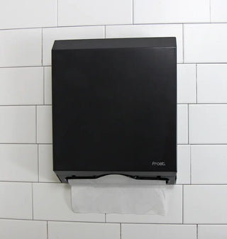 Matte black wall-mounted Frost universal paper towel dispenser with keyed lock, front-loading access, and slim steel construction.