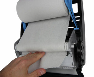 Wall-mounted Frost mechanical hands-free paper towel dispenser with transparent vandal-resistant polycarbonate cover and side paper advance knob.