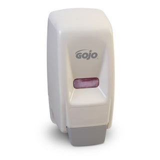 A white GOJO bag-in-box dispenser for soap or cleaning products.