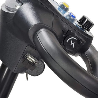 Close-up of a motorcycle handlebar with control buttons and USB port on a white background