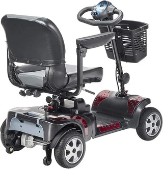Black and gray mobility scooter with a basket on a white background