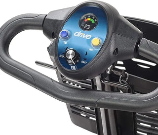 Close-up of a scooter handlebar with control panel displaying the brand 'drive'.