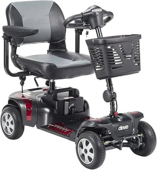 Black mobility scooter with a basket on a white background