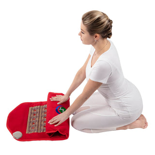 Woman folding the flexible HealthyLine Amethyst Legacy 3618 mat