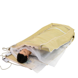 User wrapped in a HealthyLine 360 Wrap mat with the envelope cover