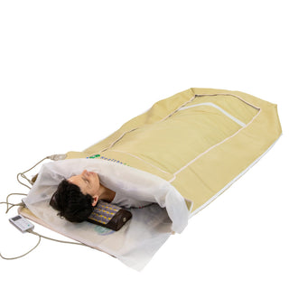User resting on a pillow inside the HealthyLine envelope cover