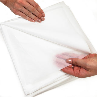 Hands opening a HealthyLine disposable envelope cover