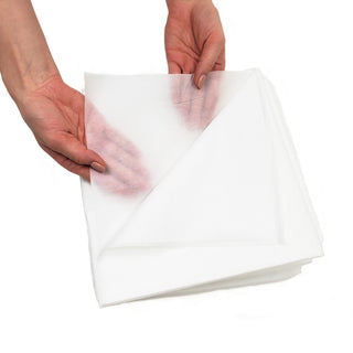 Hands showing the thin material of the HealthyLine envelope cover