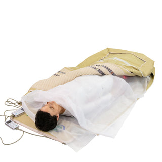 HealthyLine envelope cover being closed over a user in a 360 Wrap mat