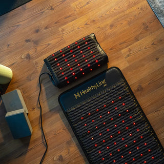 HealthyLine Jet mat and Jet Pillow on a wooden floor