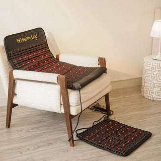 HealthyLine Jet mat on an armchair with the square pad on the floor