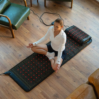 Woman meditating on the HealthyLine Jet mat