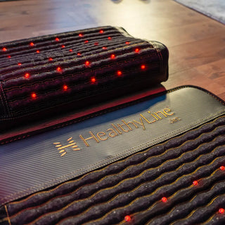 HealthyLine Jet Pillow resting on a Jet mat with lights on