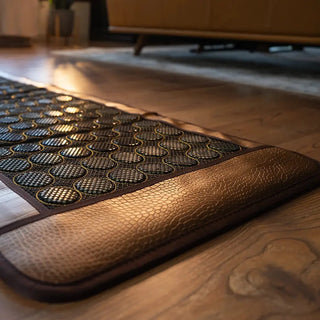 Edge of the HealthyLine Mesh JT mat on a wooden floor