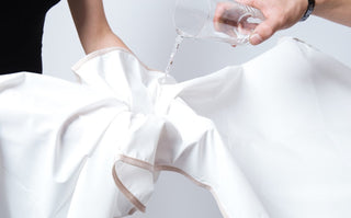 Water being poured onto the HealthyLine padded cover