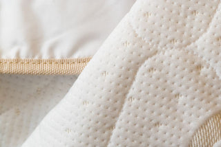 Close view of the quilted cotton top of the HealthyLine padded cover