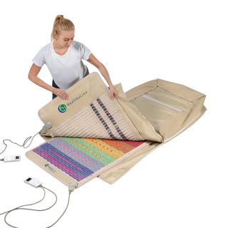 Woman opening the HealthyLine Rainbow Chakra 360 Wrap Set