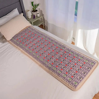 HealthyLine TAJ mat laid on a bed in a bedroom
