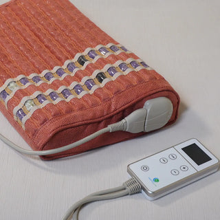 Heated HealthyLine TAO Pillow connected to its controller