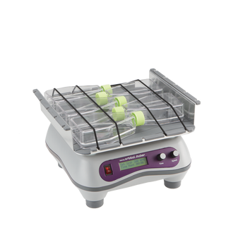 Heathrow Scientific 120460 Digital Orbital Shaker with clear containers holding green bottles on a white background