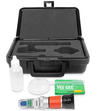 Black carrying case with foam interior, Heathrow Scientific 43006-KIT Honey Moisture Refractometer Field Kit, and cleaning tools on a white background