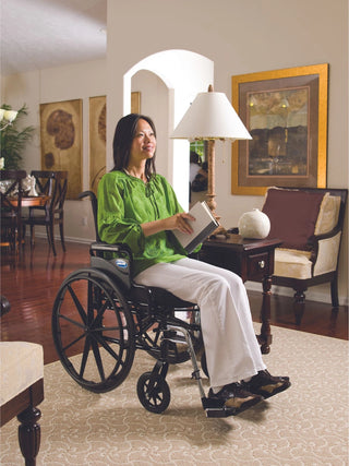 Invacare 9000 XT lightweight wheelchair with 250-lb capacity, adjustable center-of-gravity, dual-axle height adjustment, urethane casters & space-saver desk arms—custom fit performance. Order now.