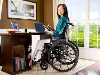 Invacare 9000 XT lightweight wheelchair with 250-lb capacity, adjustable center-of-gravity, dual-axle height adjustment, urethane casters & space-saver desk arms—custom fit performance. Order now.