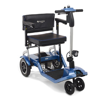 Journey So Lite 08474 folding power scooter in blue, with the front basket and footplate visible.