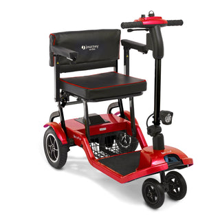 Journey So Lite 08474 folding power scooter in red, shown from the side with its padded seat and straight tiller.