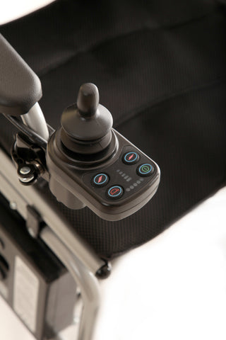 Close-up of the joystick control panel on the armrest of the Journey Air Elite 08642 power chair