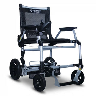 Journey Zoomer 09017 power chair in black, seen from the front with the joystick on the right armrest.