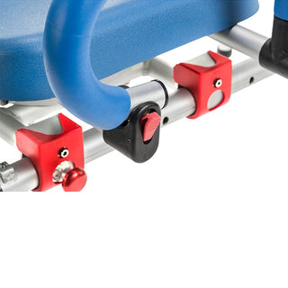 Close view of the armrest release button on the Journey 33322 SoftSecure transfer bench