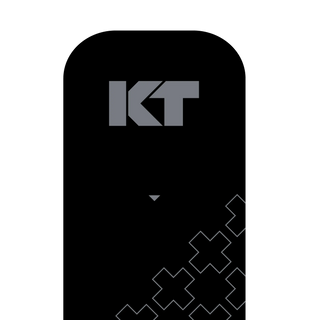 Close-up of a Jet Black KT Tape Pro Extreme precut strip showing the heat-stamped logo