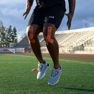 Lifestyle photo showing KT Tape Pro kinesiology tape in use