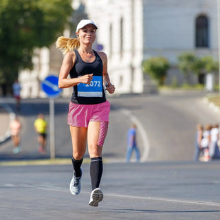 Lifestyle photo of KT Tape Pro Pink Polka Dot kinesiology tape in use