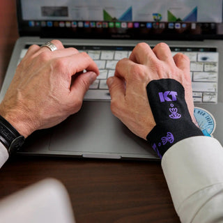 KT Tape Soothe kinesiology tape applied to a wrist