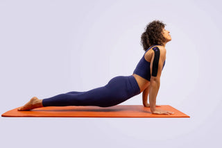KT Tape Soothe kinesiology tape worn during a yoga session
