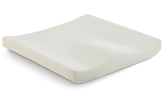 White foam mattress topper on a white background