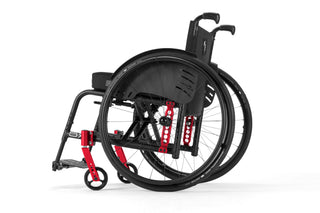 Ki Mobility Catalyst 5Vx Folding Manual Wheelcahir with red accents on a white background