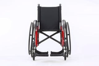 Ki Mobility Catalyst 5Vx Folding Manual Wheelcahir with red accents on a white background