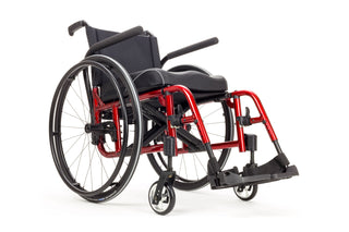 Ki Mobility Catalyst 5 (K0005) Ultra-Lightweight Folding Manuel Wheelchair with red frame on a white background