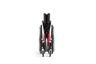 Ki Mobility Catalyst 5 (K0005) Ultra-Lightweight Folding Manuel Wheelchair with red accents on a white background